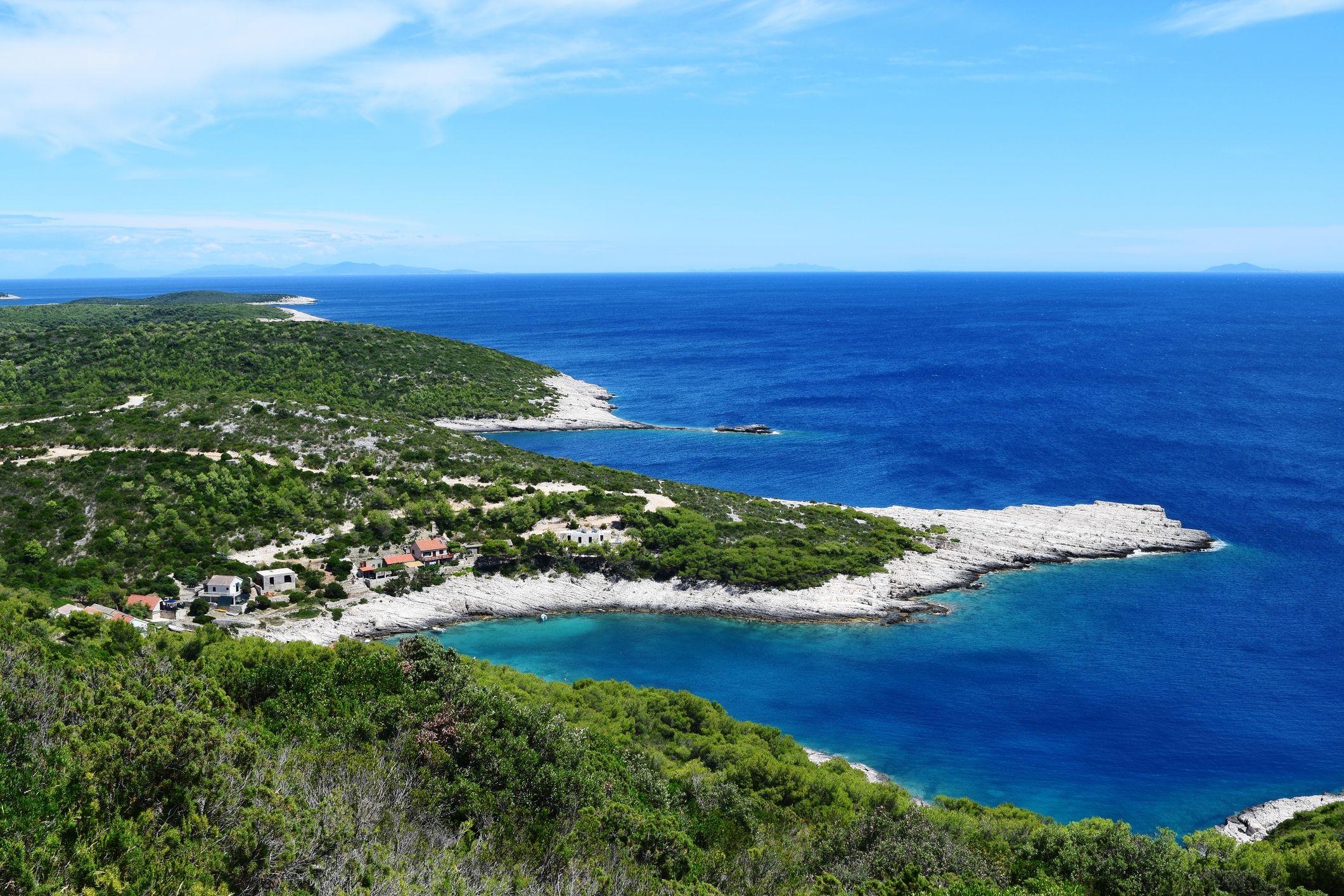 Crystal-clear water in a secluded southern bay of Vis island, Dalmatia, Croatia